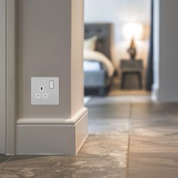 British General Evolve 13A 1-Gang SP Switched Socket Brushed Steel  with White Inserts