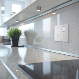 British General Evolve 13A 1-Gang SP Switched Socket Brushed Steel  with White Inserts