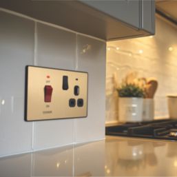 British General Evolve 45A 2-Gang 2-Pole Cooker Switch & 13A DP Switched Socket Satin Brass with LED with Black Inserts