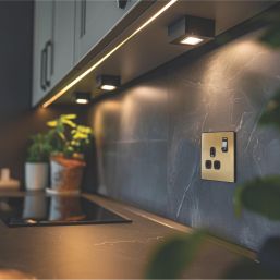 British General Evolve 13A 1-Gang SP Switched Socket Satin Brass  with Black Inserts