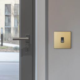 British General Evolve 10A 1-Gang 1-Way Press Switch Satin Brass with Black Inserts