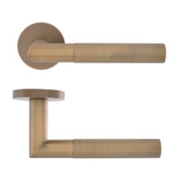 Eclipse Ultimate Revolve Fire Rated Lever On Rose Door Handle Pair Antique Brass 1 Pair