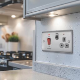 British General Nexus Metal 45A 2-Gang DP Cooker Switch & 13A DP Switched Socket Brushed Steel with LED with Graphite Inserts