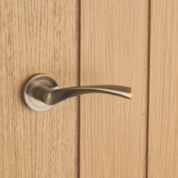 Designer Levers Marvel Lever on Rose Door Handle Pair Antique Brass