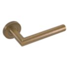 Eclipse Insignia Mitred Fire Rated Lever on Rose Door Handle Pair Antique Brass