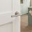 Cooke & Lewis Wembrit Lever on Rose Door Handles Pair Satin Nickel