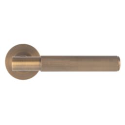 Eclipse Insignia Premium  Fire Rated Linear Lever On Rose Door Handle Pair Antique Brass 1 Pair