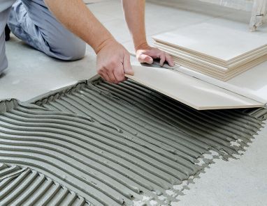 Image of floor tiles being laid